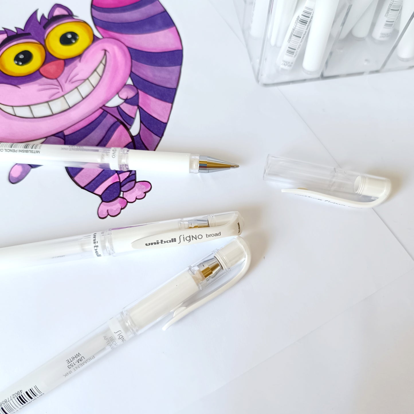 Stylo roller Signo Uni-Ball blanc 1mm