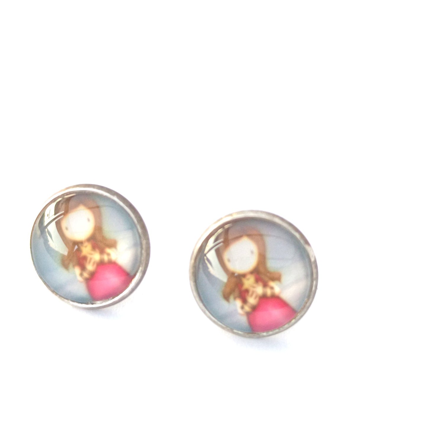 Boucle d'oreille en cabochon de verre. Motif fée